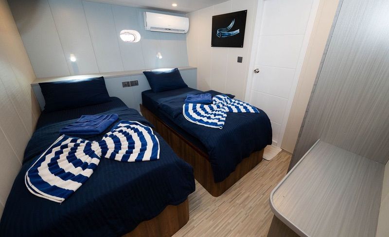 Lower deck cabin with twin beds that can be adapted to doubles